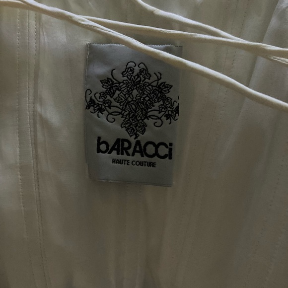 A One of a kind Baracci wedding gown or either evening gown can we use this both - Picture 2 of 8